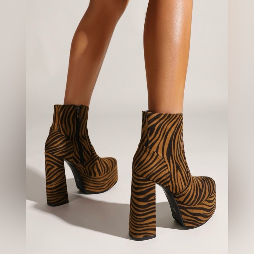 Zebra platforms, never worn.